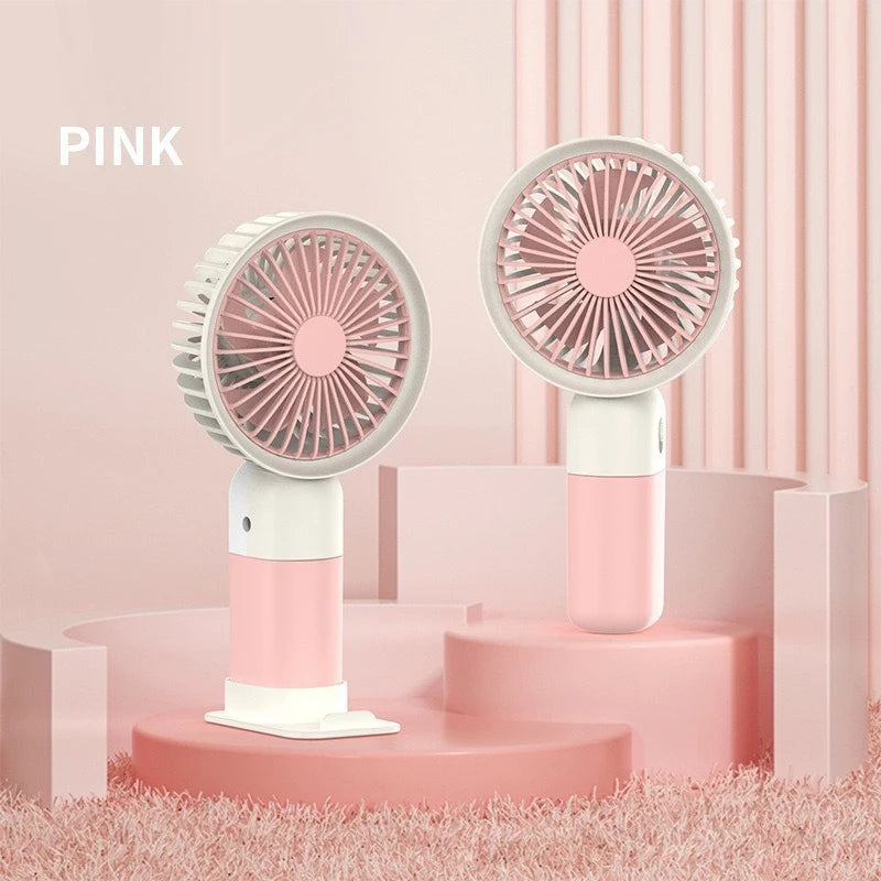 Portable silent charging fan with a phone holder, suitable for carrying or using on a desktop.