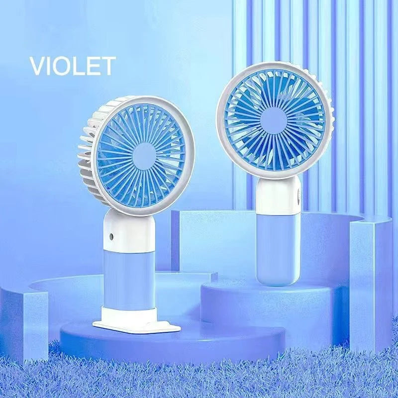 Portable silent charging fan with a phone holder, suitable for carrying or using on a desktop.