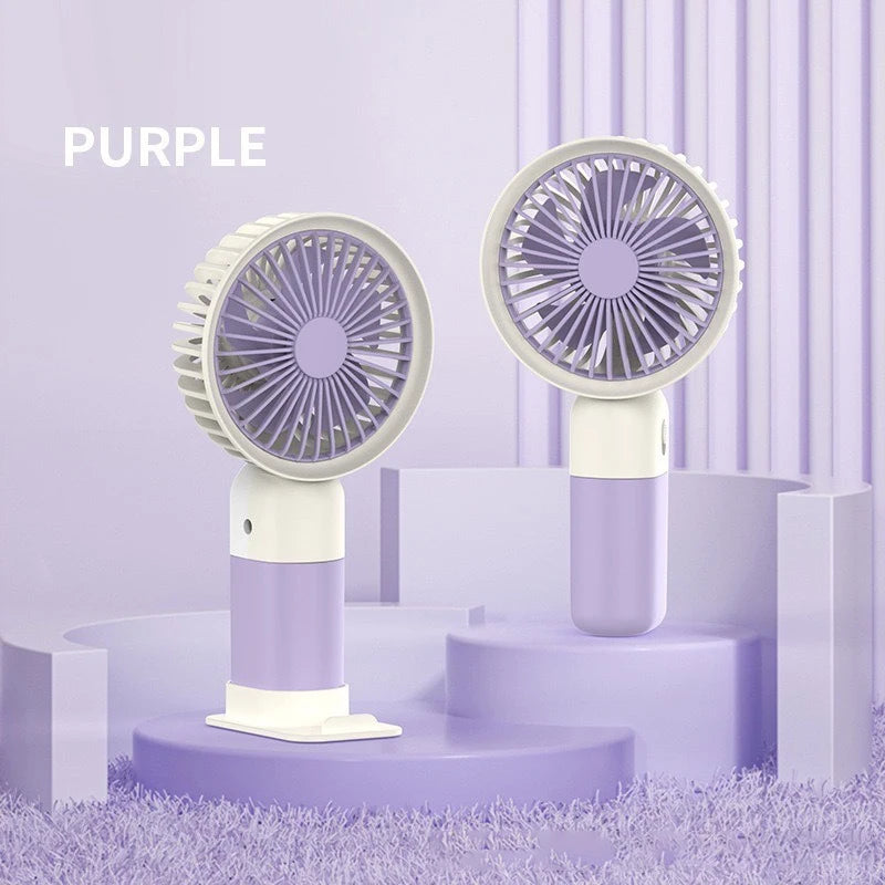 Portable silent charging fan with a phone holder, suitable for carrying or using on a desktop.